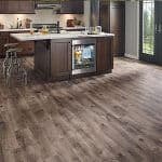 Image of a modular island kitchen with laminated flooring.