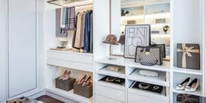 A modular warrdrobe with luxuary bags and shoes.