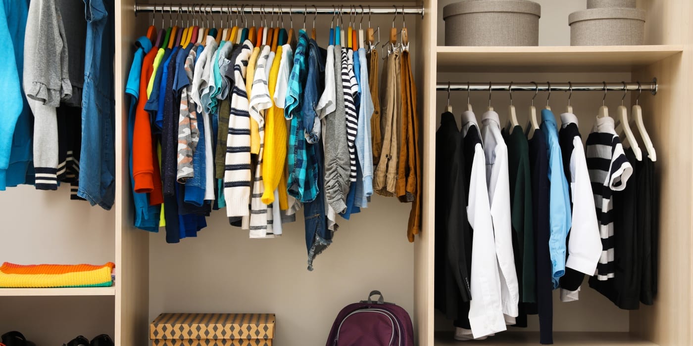 A large children's room wardrobe with children's clothes, shoes and accessories.