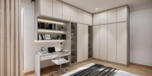 Stylish wardrobe attached to study table for efficient use of space.